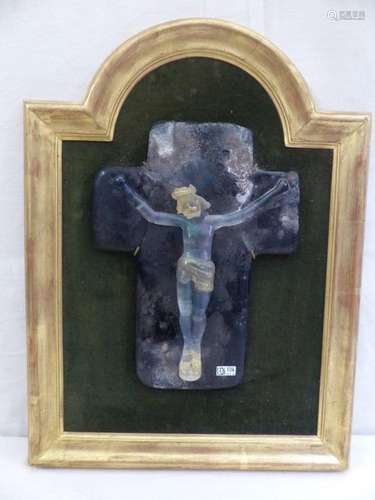 A Christ on the cross made of Venetian glass.