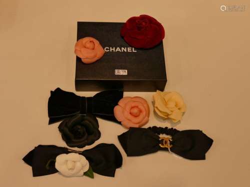 Set includes 8 Chanel branded hair pins, clips and…