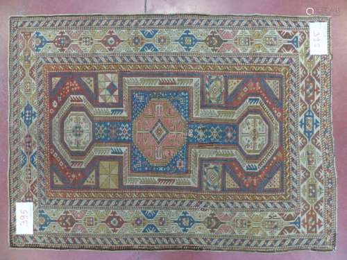 A woollen rug with geometric decoration, ancient S…