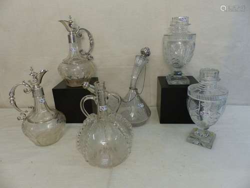 A set including a pair of crystal decanters with 8…