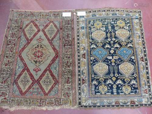 Two woollen rugs with geometric Caucasian and Turk…