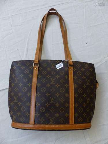 Louis Vuitton branded bag.