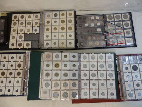 A collection of coins including silver, gold, nick…