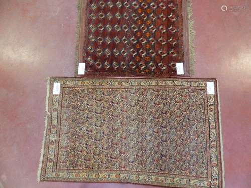 Two handmade woolen rugs, one decorated with \