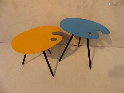 Pair of tripod tables in the shape of a \