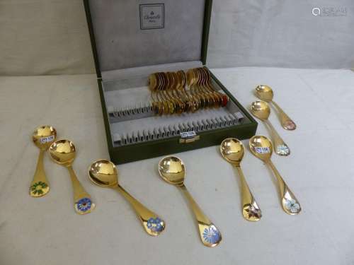 Suite of 24 silver gilt spoons with floral design …