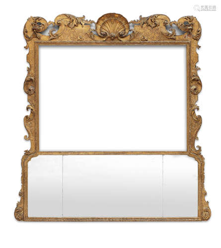 A George II giltwood and gilt gesso overmantel trumeau mirror lacking a picture within the upper frame