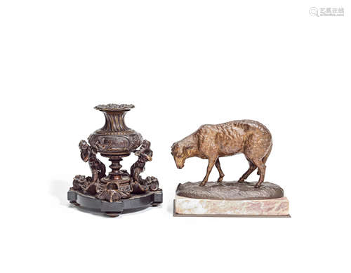 A late 19th / early 20th century French bronze model of a ewe together with a Renaissance style bronze candlestick