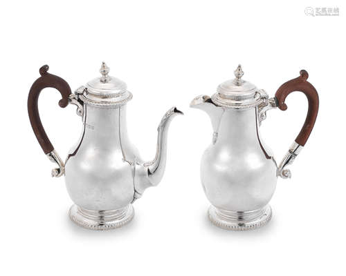 A pair of silver café au lait pots Harrods Ltd, London 1937