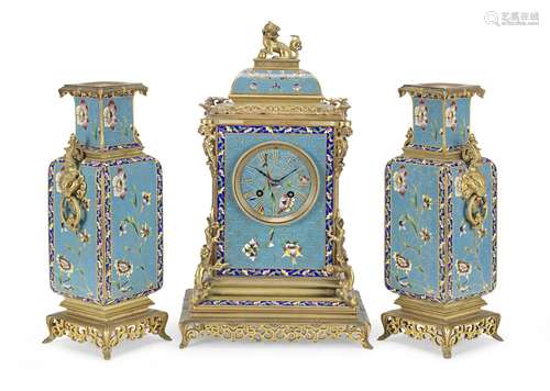 A good late 19th century French gilt bronze and champleve enamel Japonisme clock garniture the movement stamped A.F. 3