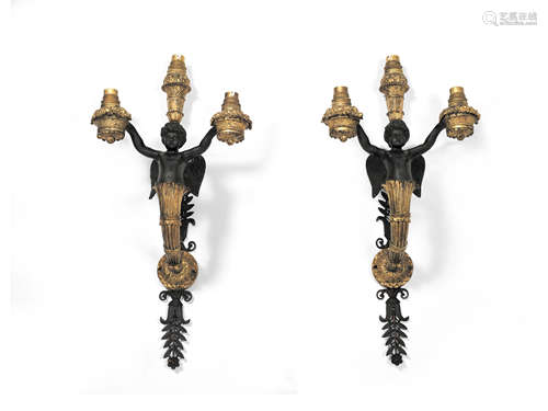 A pair of 19th century gilt and patinated bronze figural three light wall appliques in the Restauration style