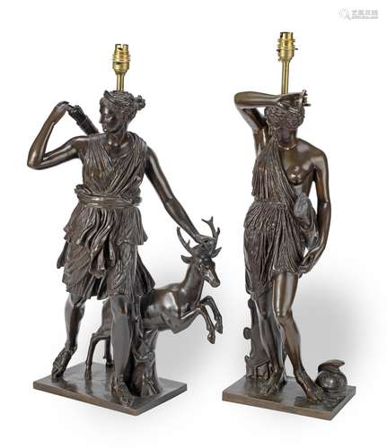 A pair of matched late 19th century Barbedienne patinated bronze Grand Tour type figures later converted to lamp bases