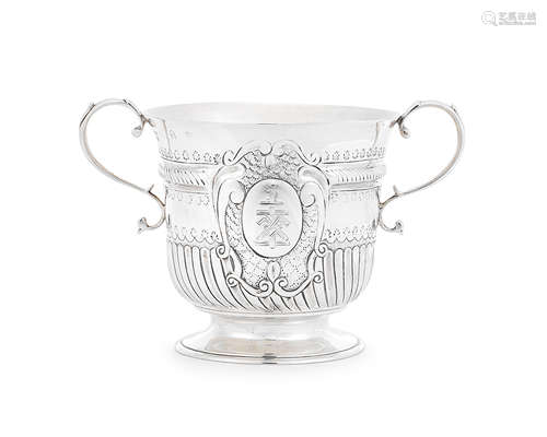 A Queen Anne silver porringer John Cory, London 1706