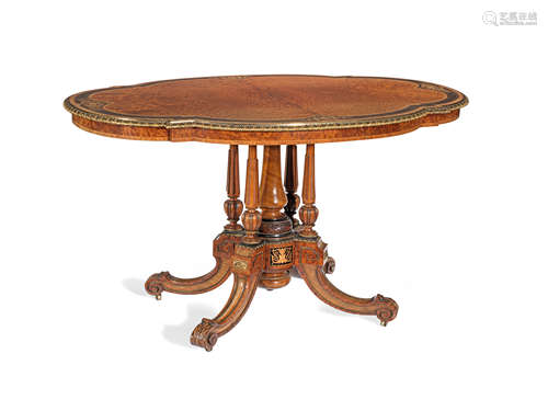 A mid Victorian gilt bronze mounted burr yew, tulipwood crossbanded, ebonised and inlaid centre table