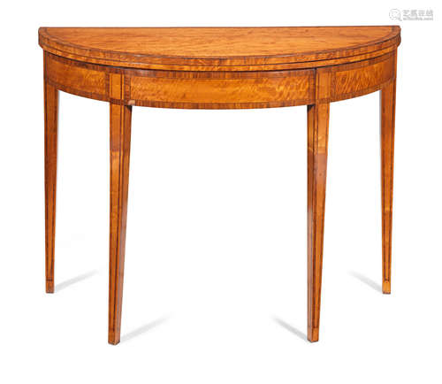 A George III satinwood and kingwood crossbanded demi-lune card table