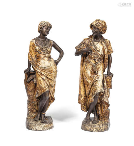 A pair of late 19th/early 20th century Austrian cold painted spelter Orientalist figures of a of a Moor and his female companion