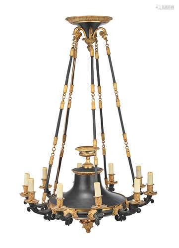 An early 20th century gilt and patinated bronze ten light colza style chandelier in the Empire style