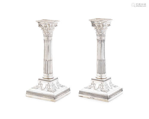 A pair of Edwardian silver dwarf candlesticks James Dixon & Sons, Sheffield 1908