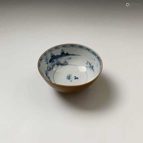 A Chinese Nanking Cargo blue and white cafe-au-lait bowl, 18th century, Christies label, height 7cm,