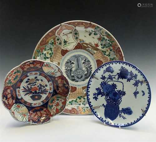 A Japanese imari charger, late 19th century, diameter 36.5cm, and two Japanese dishes, diameter 24.