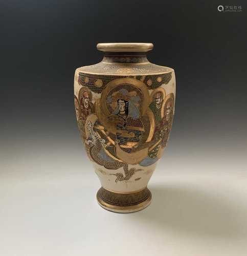 A large Japanese Satsuma pottery vase, late 19th century, with paper labels to underside,