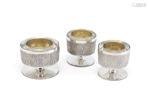 GERALD BENNEY: a silver salt cellar and two mustards London 1990, 1990 and 1975 respectively (3)