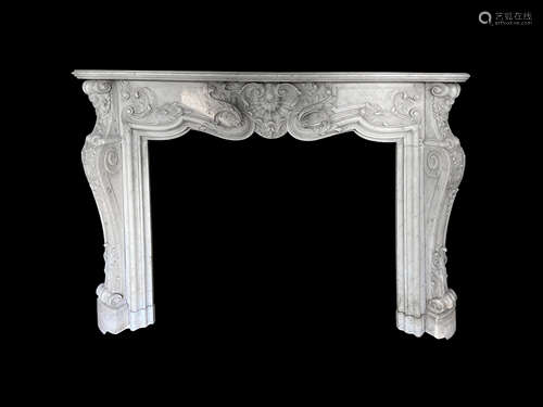 A late 19th century French carved white marble 'Pompadour' chimneypiece in the Louis XV style