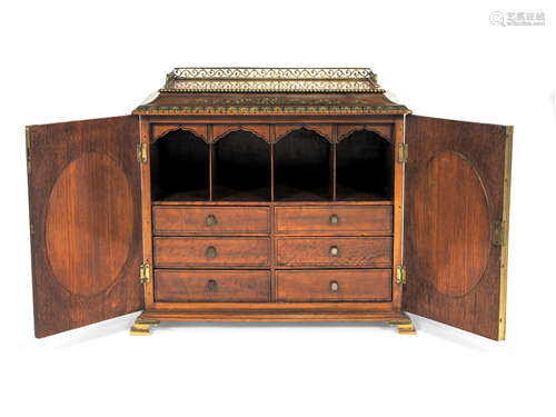 A good late 19th century Sheraton revival painted satinwood, inset silk needlework and gilt brass mounted table cabinet