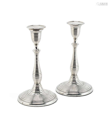 An unusual pair of George III silver candlesticks Samuel Roberts, George Cadman & Co, Sheffield 1802 (2)