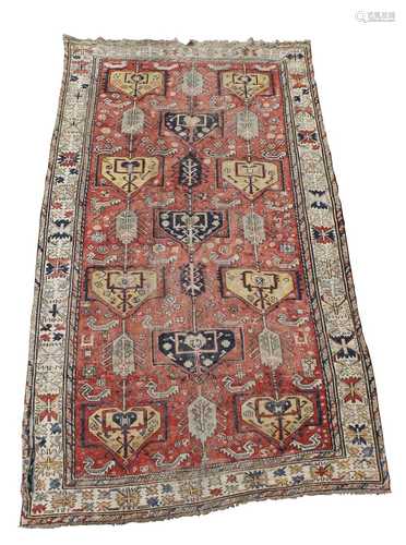 A Soumakh carpet, East Caucasus, the madder field with polychrome medallions, animals and guls,