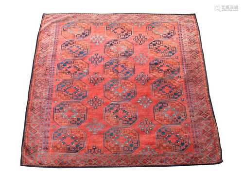 An Turkoman Ersari carpet, the madder field with six rows of three octagonal medallions and