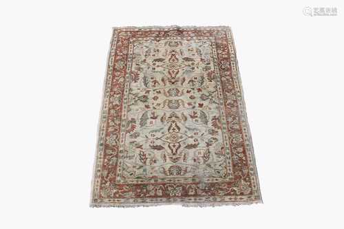 A Ziegler design chobi rug, the ivory field with all over design of scrolling flowering vines and