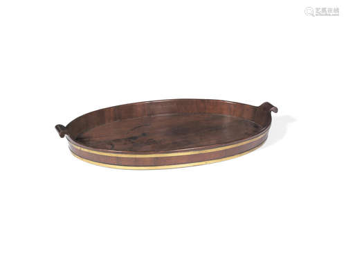 A George III mahogany and brass bound oval tray