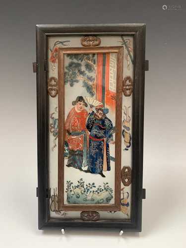 A Chinese reverse painting on glass, circa 1900, with figures in traditional costume, one holding