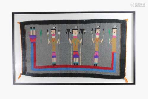 A Navajo corn rug, 20th century, the grey field with a row of figures, within a charcoal border,