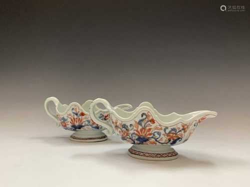 A pair of Chinese export Imari pattern sauce boats, 18th century, one restored, height 10cm,