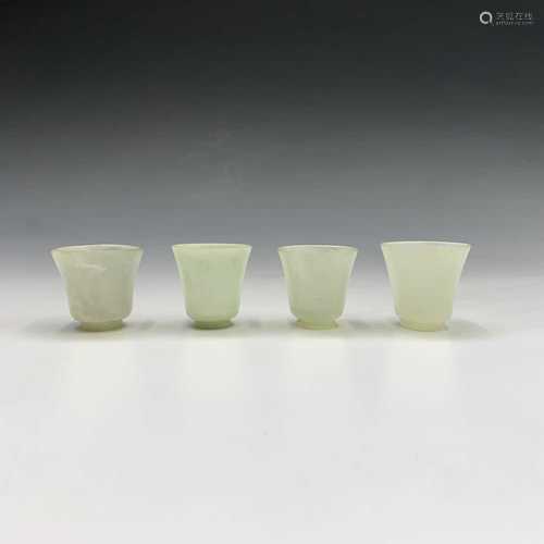 Four Chinese jade wine cups, largest height 4.3cm, diameter 4.2cm.