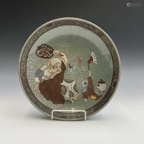 A Japanese celadon crackle-glazed Satsuma dish, 20th century, diameter 31cm.