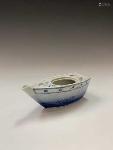 A Japanese porcelain teapot in the form of a boat, late 19th century, with character marks,