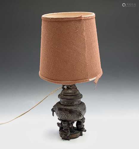 A Chinese bronze lidded urn, adapted to a table lamp, height of urn 31cm.