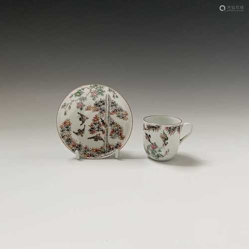 A Japanese porcelain cup and saucer, Meiji period, red six character marks.Condition report: UK