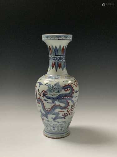 A Chinese Wucai porcelain baluster vase, Wanli six character mark, the stylised dragon and phoenix