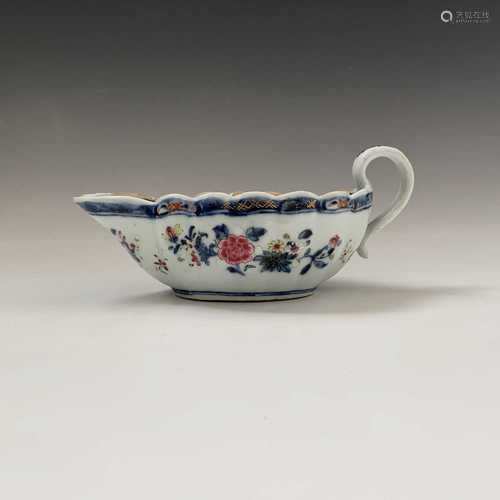 A Chinese famille rose 'tobacco-leaf' sauce boat, Qianlong Period, height 9cm, length 19.5cm,