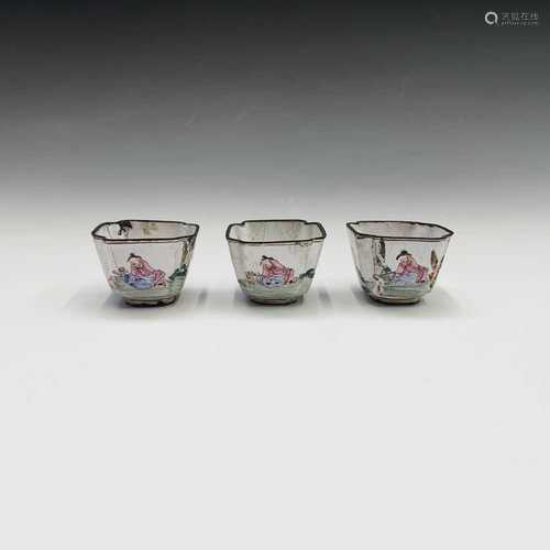 A set of three Chinese enamel famille rose wine cups, 18th century, each decorated with three