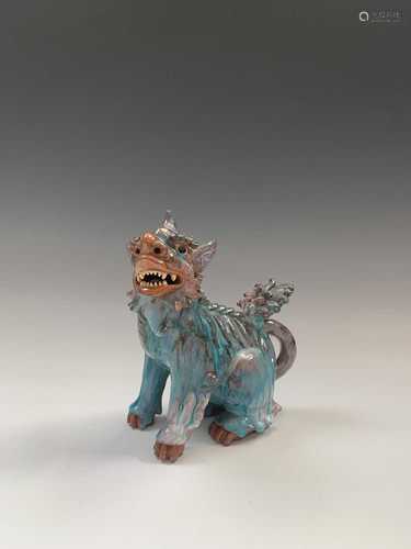 A Japanese earthenware shishi or temple dog, early 20th century, height 19cm, width 16.5cm.Condition