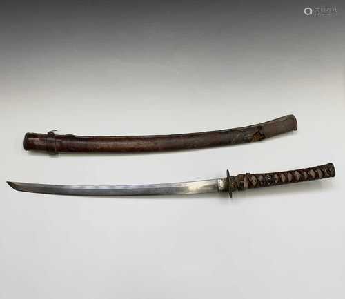 A Japanese WWII Katana sword, with steel blade and tsuba, gilt bronze mount, shagreen handle covered