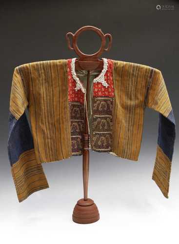 A Ceremonial Ikat jacket, Bengkula, Sumatra, Indonesia, with gold thread weaving and couched