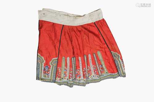 A Chinese silk embroidered skirt, Qing Period, with sea creatures and waves, length 96cm, width of