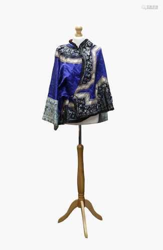 A Chinese silk embroidered jacket, Qing Period, with butterflies and floral decoration, length 74cm,