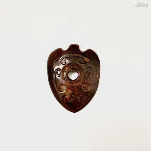 A Chinese jade heart-shaped pendant, 6.3 x 4.8cm.